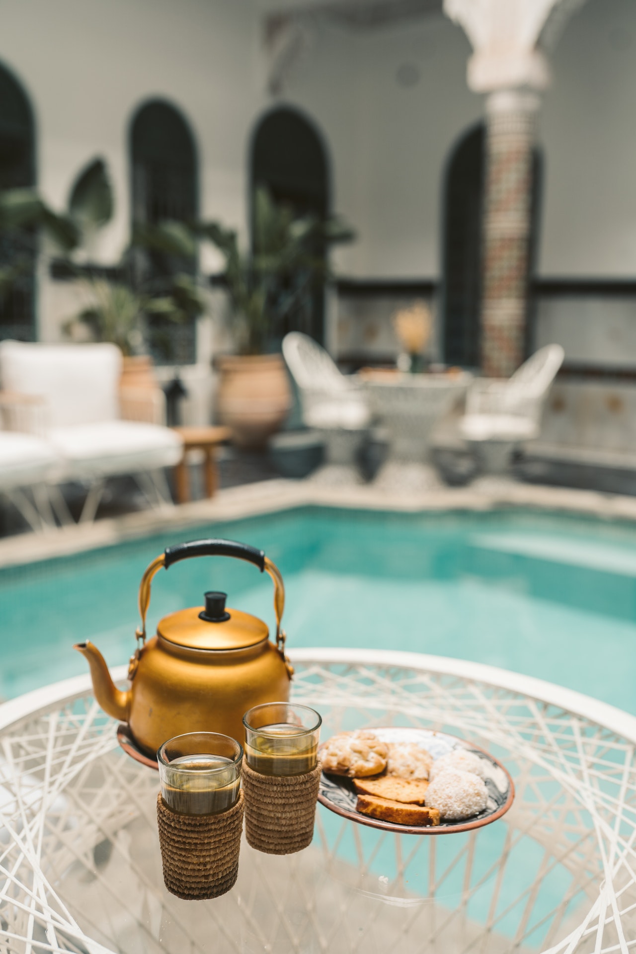 Gold Teapot on White Round Table - Marrakech