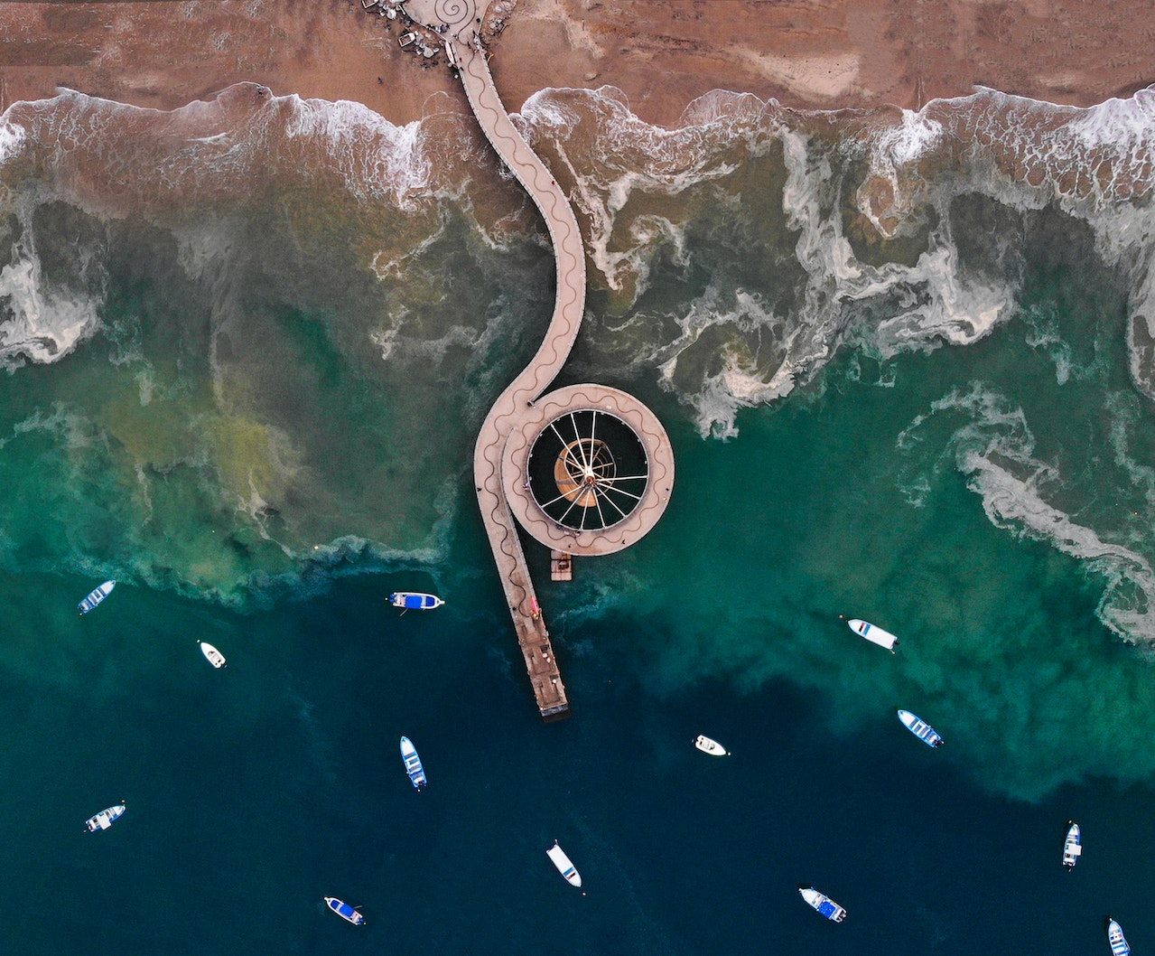 Long Curvy Pier in Sea - Mexico